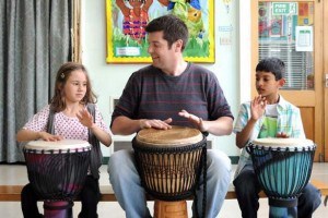 chris-greer-from-school-drumming-works-with-year-2-pupils-holly-smith-and-dilraj-sohal-756594363