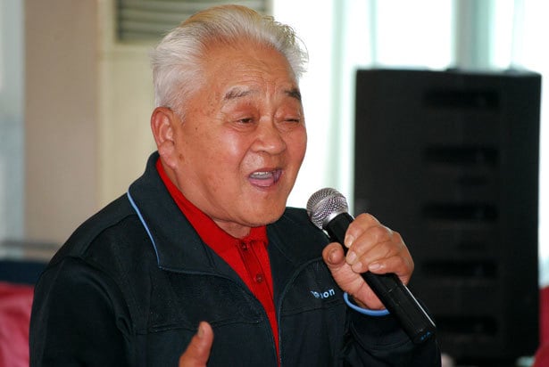 elderly man singing