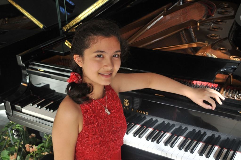 young girl pianist