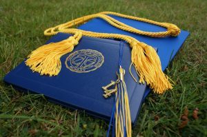 certificate and graduation hat