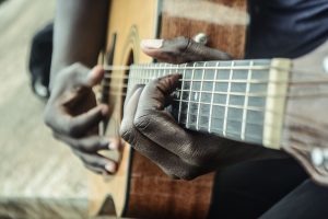 holding an open chord