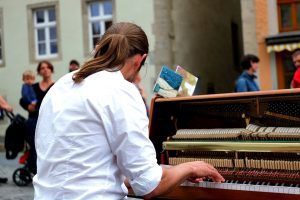 a piano performance in the open square