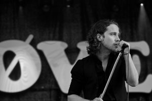 a man singing at a concert