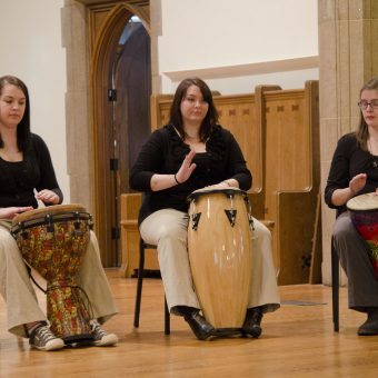 ladies playing different drums