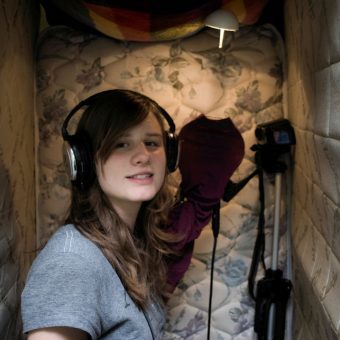 woman recording at a studio