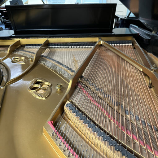 Image of the strings and soundboard, vintage Baldwin Model L in Satin Ebony