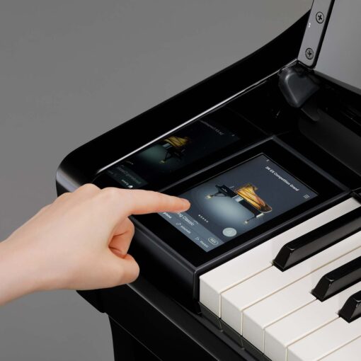 Image showing someone using the control panel of a Kawai CA901 Hybrid Digital Piano in Ebony Polish