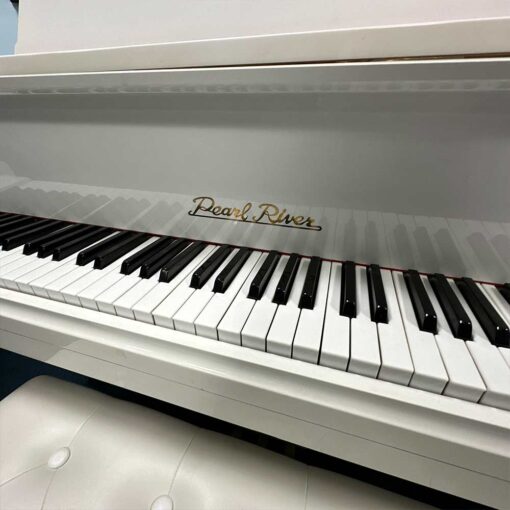 Used Pearl River Polished White Grand Piano Logo