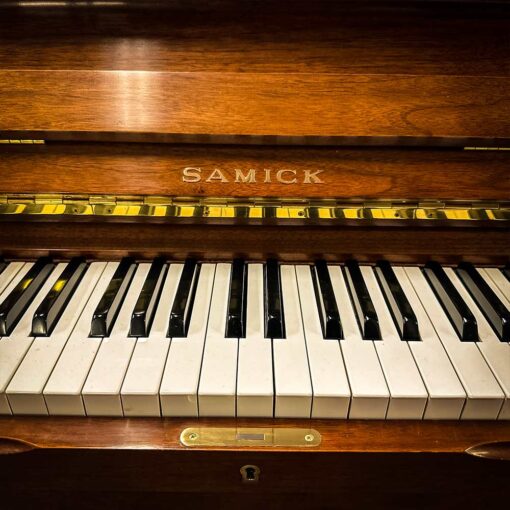 Used Samick SU118 Upright Piano in Satin Walnut Logo