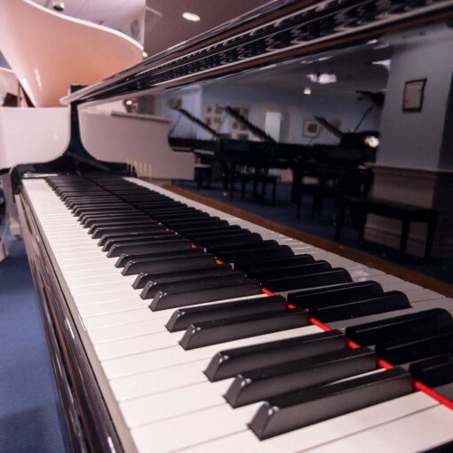 Used Yamaha GH1 Grand Piano in Polished Ebony keys right view