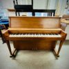 Used Wurlitzer Upright Piano in Satin Oak