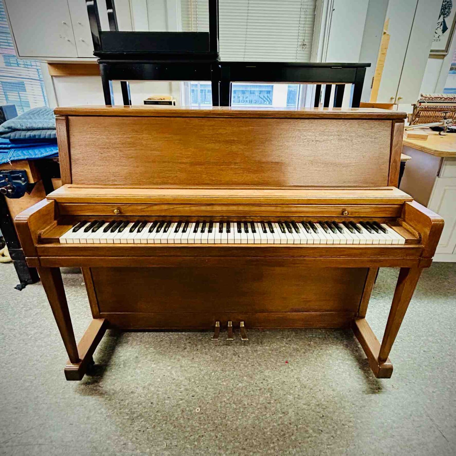 Used Wurlitzer Upright Piano in Satin Oak