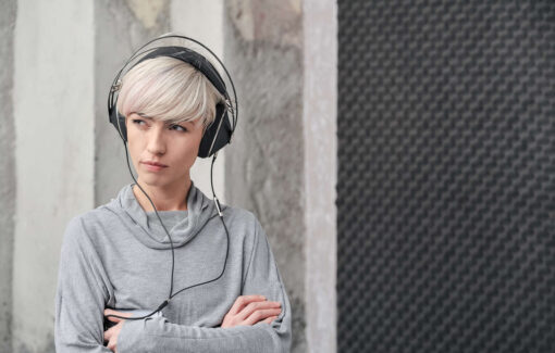 A woman with Meze 99 Neo Headphones