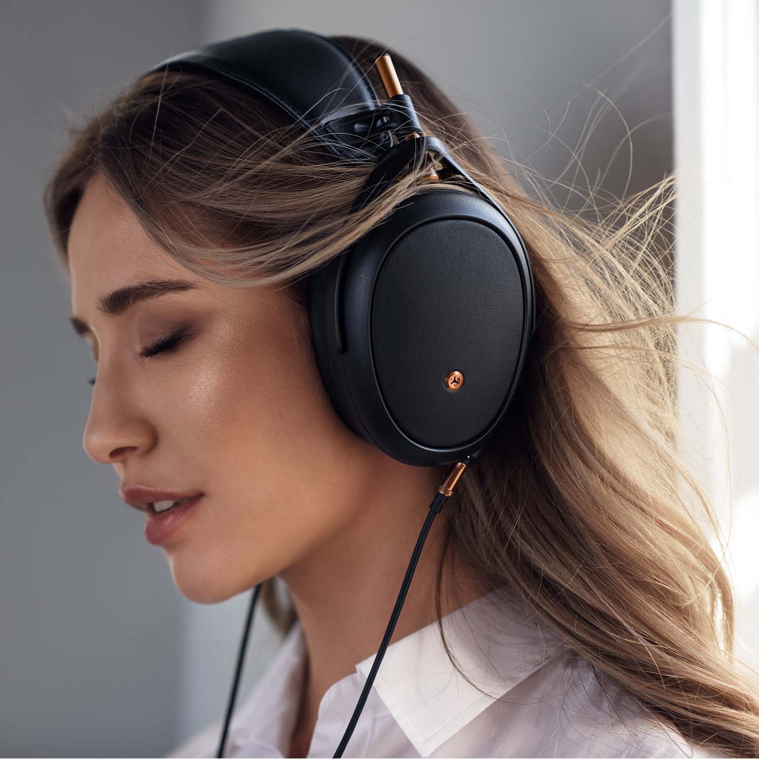 Woman Wearing Meze Liric Headphones