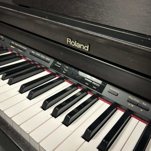 Roland HP302 Digital Piano Logo